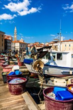 Harbour basin with fishing port, harbour town of Piran on the Adriatic coast with Venetian flair,