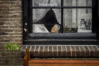 Window with head sculpture at the museum, window, head, whimsical, art, fun, culture, history,