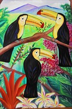 San Juan del Sur, Nicaragua, Colourful mural of four toucans surrounded by tropical flora, Central