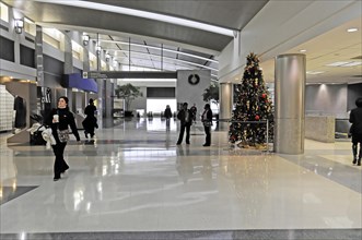 AUGUSTO C. SANDINO Airport, Managua, Nicaragua, Spacious lobby of an airport with a Christmas tree