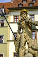 The Neptune Fountain in front of the Hofapotheke, market square in Weimar, Thuringia, Germany,