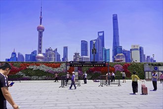 View from the Bund to the skyline at the Huangpu River with Oriental Pearl Tower, World Financial