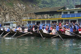 Passengers boarding boats at a pier for a tour on the river, Yichang, Yichang, Hubei Province,