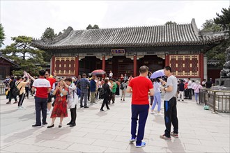 New Summer Palace, Beijing, China, Asia, A group of tourists visits a temple with traditional