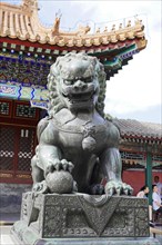 New Summer Palace, Beijing, China, Asia, An imposing stone statue of a lion, a guardian of