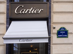 Paris 8e arrondissement. Cartier shop on the Champ Elysees. Ile de France, France, Europe