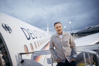 Christian Lindner (FDP), Federal Minister of Finance, pictured boarding an aircraft of the