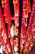 Jade Buddha Temple, Shanghai, ceiling full of red Chinese lanterns in traditional arrangement,