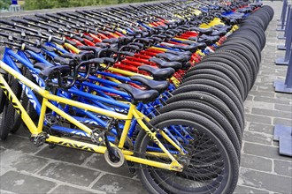 Rental bicycles, Xian, Shaanxi, China, AsiaArranged rows of bicycles in different colours for