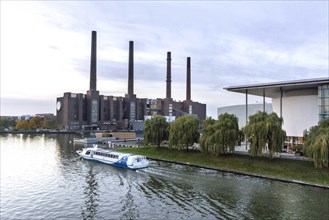 A ship passes the VW plant in Wolfsburg on the Mittelland Canal, 25 October 2015, Wolfsburg, Lower