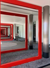 Modern Building with Red Frame to Infinity in Switzerland
