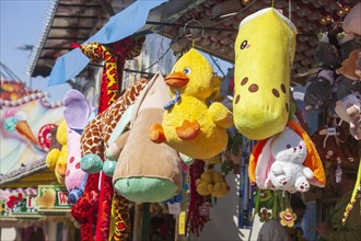 Colourful stuffed animals at a lottery booth at the Bremen Easter Fair, Buergerweide, Bremen,