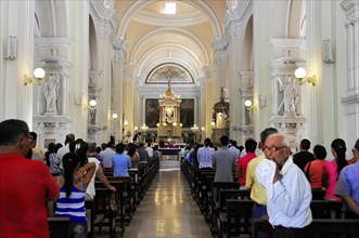 Catedral de la Asuncion, built in 1860, Leon, Nicaragua, People during a service inside a church