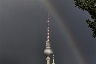 A rainbow looms behind the television tower Berlin, 15/04/2024
