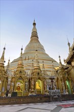 Shwedagon Pagoda, Yangon, Myanmar, Asia, The Shwedagon Pagoda shines in golden light at dusk, Asia