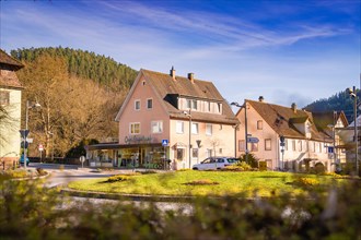 A quiet village street with shops and houses on a sunny day, Spring, Calw, Black Forest, Germany,