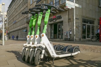 E-scooters parked in the bike hire centres of Lime, OnLime and Uber, Bremen, Germany, Europe