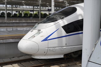 Express train CRH380 to Yichang, A modern train stands for maintenance at the railway station,