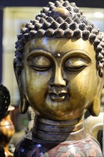 Xian, Shaanxi Province, China, Asia, Close-up of a bronze statue of a Buddha with artistic details,