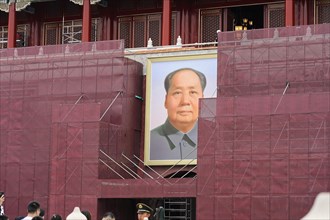 China, Beijing, Forbidden City, UNESCO World Heritage Site, A political portrait on the facade of a