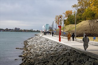 Detroit, Michigan, People walking on the Detroit Riverwalk, on the site of the old Uniroyal tire