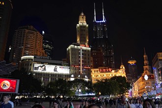 Shanghai by night, China, Asia, Lively city square at night with impressive illuminated skyline,