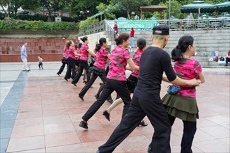 Residents of Chongqing dancing in the city centre, Chongqing, China, Asia, Several couples practice