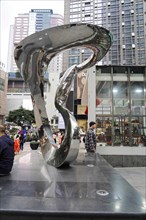 Stroll in Chongqing, Chongqing Province, China, Asia, A spiral-shaped reflective sculpture stands