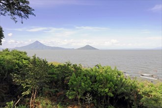 Lake Nicaragua, Ometepe Island in the background, Nicaragua, A tranquil seascape with trees in the