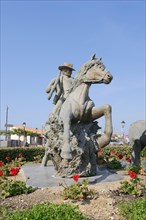 Statue of a drover with Camargue horse, Les Saintes-Maries-de-la-Mer, Camargue, Bouches-du-Rhone,