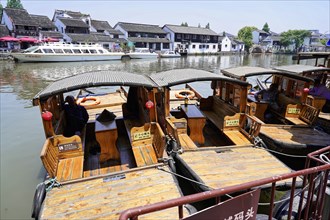 Excursion to Zhujiajiao water village, Shanghai, China, Asia, wooden boat on canal with view of