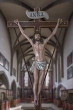 Life-size, carved figure of Jesus on the cross, 350-year-old processional figure in St Michael's