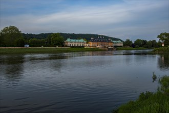 Pillnitz Palace in the evening sun, seen from the opposite side of the Elbe in Kleinzschachwitz,