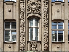 Facade detail, heritage-protected building in Kroepeliner Strasse in the historic city centre of