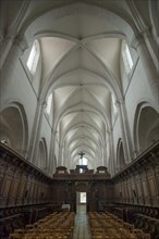 Oak choir stalls, 17th century, and ribbed vault in the former Cistercian monastery of Pontigny,