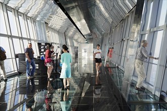 Viewing terrace, The Bottle Opener at 492 metres, people on a viewing platform with glass floor and