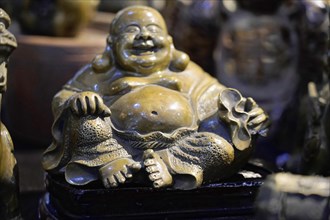 Xian, Shaanxi Province, China, Asia, Figure of a laughing Buddha, a symbol of happiness and