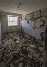 Abandoned destroyed room full of rubble, ghost town, Engilchek, Tian Shan, Kyrgyzstan, Asia