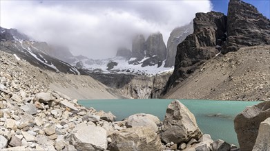 Meltwater lake in front of the Paine Horns, Base of Torres del Paine Hike, Torres de Paine,