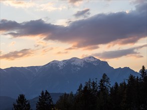 Evening mood after sunset, snow-covered Alpine peaks, Reiting massif, view from the lowlands,