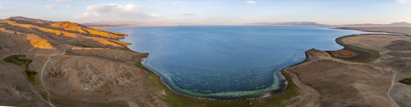 Aerial view, Vast empty landscape at the mountain lake Song Kul, Moldo Too Mountains, Naryn region,