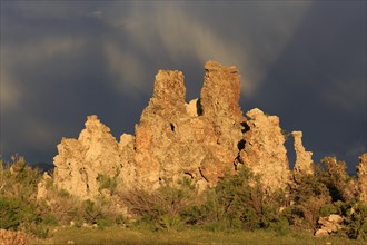 Dramatic rock formations against a cloudy sky at dusk, Mono Lake, North America, USA, South-West,