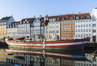 Moored Gedser Rev ship and colourful 17th century apartment buildings and houses along the Nyhavn