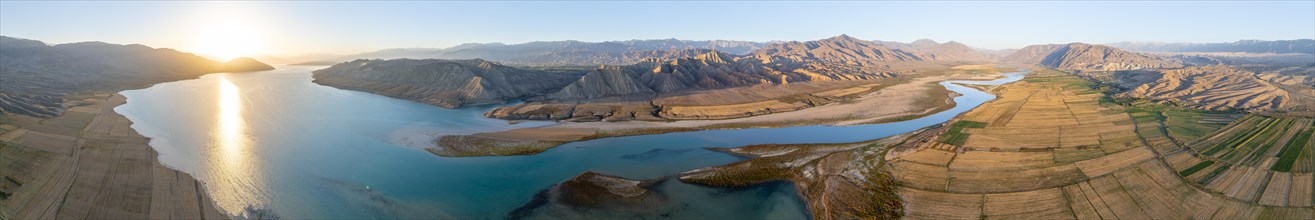 Panorama, River mouth of the Naryn River at Toktogul Reservoir at sunset, aerial view, Kyrgyzstan,