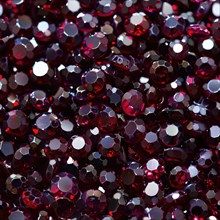 Seamless pattern of gleaming garnets on a deep burgundy backdrop AI generated