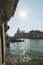 Silhouetted view of Grand Canal with Santa Maria della Salute basilica and Renaissance