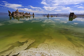 Expansive view of tufa towers in Mono Lake under an expansive blue sky, Mono Lake, North America,