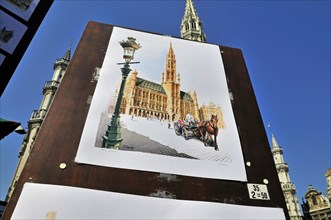 Painting, behind it the town hall with Gothic tower, Grand Place, Brussels, Belgium, Benelux,