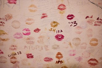 A wall covered with colourful kiss prints and personal messages, Lindos, Rhodes, Dodecanese, Greek
