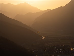 Evening light at sunset over the Liesingtal, in the evening light the village of Traboch,